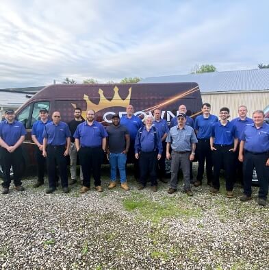 Our team standing in front of one of our trucks.