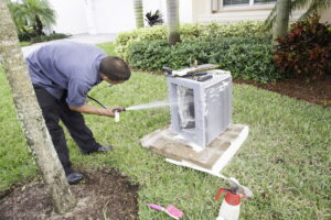 AC-repairman-washing-condenser