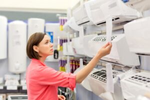 woman-choosing-air-conditioner-units