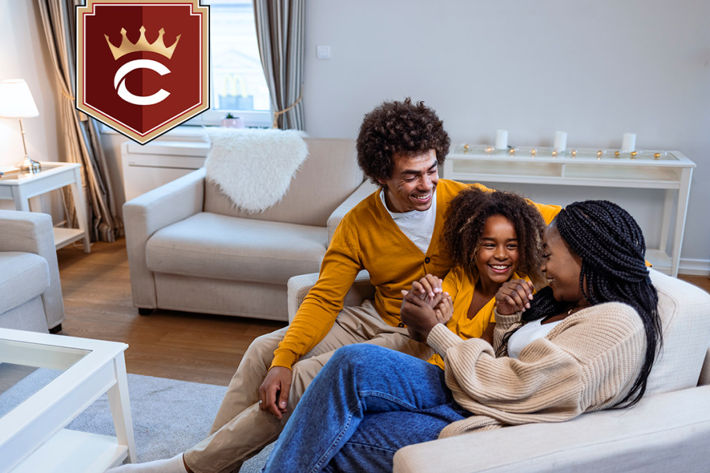 Happy young family having good time together